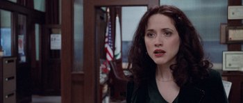 Movie still from “The Frighteners” (1996), directed by Peter Jackson – A person standing in a room; Close Up shot, Over the shoulder angle