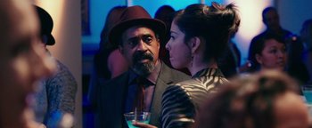 Movie still from “Popstar: Never Stop Never Stopping” (2016), directed by Akiva Schaffer – A man and a woman talking to each other; Medium shot, Over the shoulder angle