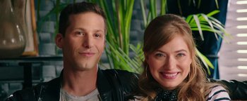 Movie still from “Popstar: Never Stop Never Stopping” (2016), directed by Akiva Schaffer – A man and a woman posing for a picture; Close Up shot, Low angle