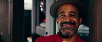 Movie still from “Popstar: Never Stop Never Stopping” (2016), directed by Akiva Schaffer – A person wearing a hat; Close Up shot, Low angle