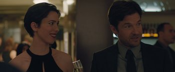 Movie still from “The Gift” (2015), directed by Joel Edgerton – A man and a woman standing next to each other; Close Up shot, Over the shoulder angle