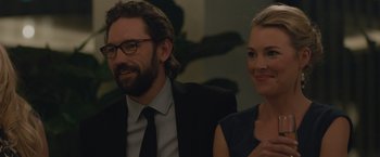Movie still from “The Gift” (2015), directed by Joel Edgerton – A man and a woman sitting next to each other; Close Up shot, Over the shoulder angle