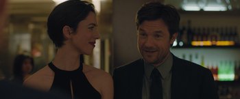 Movie still from “The Gift” (2015), directed by Joel Edgerton – A man and a woman standing next to each other; Close Up shot, Over the shoulder angle