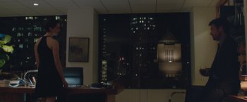 Movie still from “The Gift” (2015), directed by Joel Edgerton – A view of a city at night through a window; Wide shot, Over the shoulder angle
