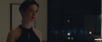 Movie still from “The Gift” (2015), directed by Joel Edgerton – A woman standing in front of a window at night; Close Up shot, Over the shoulder angle