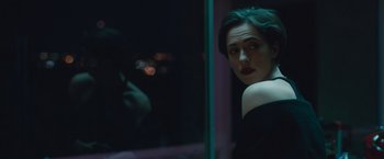 Movie still from “The Gift” (2015), directed by Joel Edgerton – A woman looking out of a window at night; Close Up shot, Over the shoulder angle