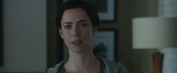 Movie still from “The Gift” (2015), directed by Joel Edgerton – A person with short brown hair; Close Up shot, Over the shoulder angle