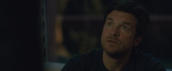 Movie still from “The Gift” (2015), directed by Joel Edgerton – A person looking up at something; Close Up shot, Over the shoulder angle