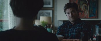 Movie still from “The Gift” (2015), directed by Joel Edgerton – A man sitting at a table in front of another man; Close Up shot, Over the shoulder angle