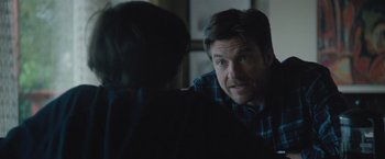 Movie still from “The Gift” (2015), directed by Joel Edgerton – A man is talking to another man in a room; Close Up shot, Over the shoulder angle
