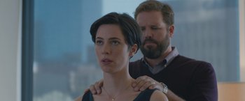 Movie still from “The Gift” (2015), directed by Joel Edgerton – A man and a woman standing next to each other; Close Up shot, Over the shoulder angle