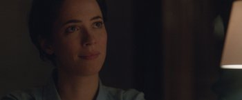 Movie still from “The Gift” (2015), directed by Joel Edgerton – A woman's face in the dark; Close Up shot, Over the shoulder angle