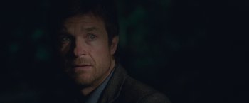 Movie still from “The Gift” (2015), directed by Joel Edgerton – A person wearing a jacket; Close Up shot, Over the shoulder angle