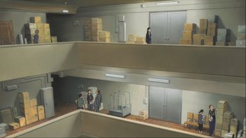 Movie still from “The Girl Who Leapt Through Time” (2006), directed by Mamoru Hosoda – A painting of people standing in a room with boxes stacked on top of each other; Extreme Wide shot, Overhead angle