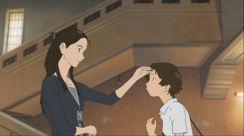 Movie still from “The Girl Who Leapt Through Time” (2006), directed by Mamoru Hosoda – An animated scene of a woman helping a young boy with his hair; Close Up shot, Over the shoulder angle