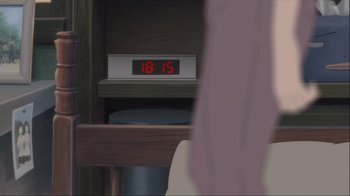 Movie still from “The Girl Who Leapt Through Time” (2006), directed by Mamoru Hosoda – An alarm clock on the wall; Extreme Close Up shot, High angle