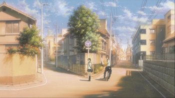 Movie still from “The Girl Who Leapt Through Time” (2006), directed by Mamoru Hosoda – Two people standing on the side of the street; Extreme Wide shot, Low angle