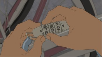 Movie still from “The Girl Who Leapt Through Time” (2006), directed by Mamoru Hosoda – A person is holding a cell phone in their hand; Extreme Close Up shot, High angle