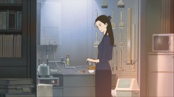 Movie still from “The Girl Who Leapt Through Time” (2006), directed by Mamoru Hosoda – A woman standing in front of a sink in a kitchen; Medium shot, Low angle