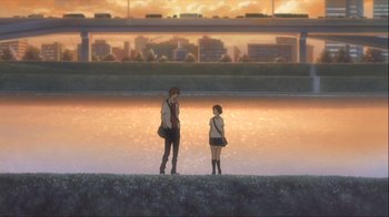 Movie still from “The Girl Who Leapt Through Time” (2006), directed by Mamoru Hosoda – Two people standing next to a body of water; Extreme Wide shot, High angle