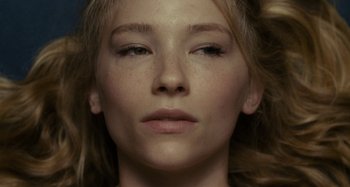 Movie still from “The Girl on the Train” (2016), directed by Tate Taylor – A woman's face with a lot of makeup on; Extreme Close Up shot, High angle