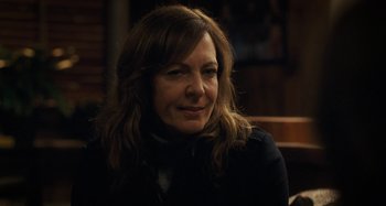 Movie still from “The Girl on the Train” (2016), directed by Tate Taylor – A person sitting in a room; Close Up shot, Over the shoulder angle