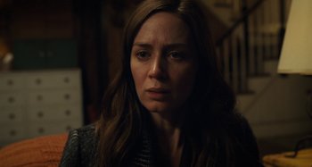 Movie still from “The Girl on the Train” (2016), directed by Tate Taylor – A person with long brown hair; Close Up shot, Over the shoulder angle