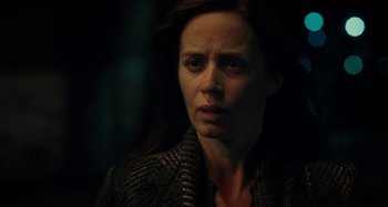 Movie still from “The Girl on the Train” (2016), directed by Tate Taylor – A person wearing a jacket; Close Up shot, Over the shoulder angle