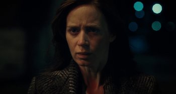 Movie still from “The Girl on the Train” (2016), directed by Tate Taylor – A person wearing a jacket; Close Up shot, Over the shoulder angle