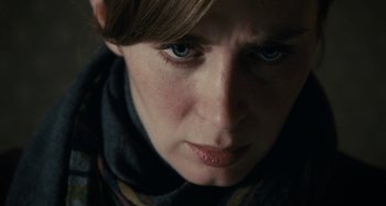 Movie still from “The Girl on the Train” (2016), directed by Tate Taylor – A woman's face with blue eyes; Close Up shot, Low angle