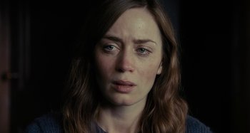 Movie still from “The Girl on the Train” (2016), directed by Tate Taylor – A person with a sad look on their face; Close Up shot, High angle