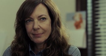 Movie still from “The Girl on the Train” (2016), directed by Tate Taylor – A person with long brown hair; Close Up shot, Over the shoulder angle
