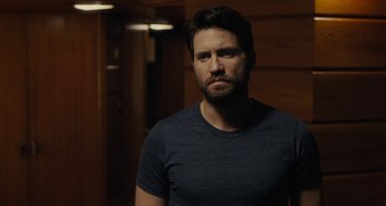 Movie still from “The Girl on the Train” (2016), directed by Tate Taylor – A person wearing a shirt; Close Up shot, Over the shoulder angle