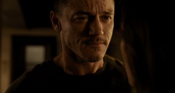 Movie still from “The Girl on the Train” (2016), directed by Tate Taylor – A person looking at the camera; Close Up shot, Over the shoulder angle