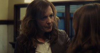 Movie still from “The Girl on the Train” (2016), directed by Tate Taylor – A person with long hair; Close Up shot, Over the shoulder angle