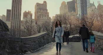 Movie still from “The Girl on the Train” (2016), directed by Tate Taylor – Two people walking on a bridge in the middle of a city; Wide shot, Over the shoulder angle