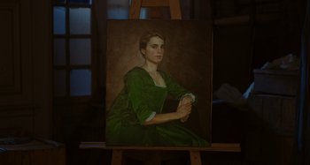 Movie still from “Portrait of a Lady on Fire” (2019), directed by Céline Sciamma – A painting of a woman in a green dress sitting on a easel; Close Up shot, High angle