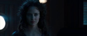 Movie still from “The Golden Compass” (2007), directed by Chris Weitz – A person with long curly hair; Close Up shot, Over the shoulder angle