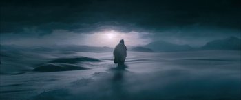 Movie still from “The Golden Compass” (2007), directed by Chris Weitz – A polar bear standing in the middle of a body of water at night; Extreme Wide shot, Low angle