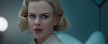 Movie still from “The Golden Compass” (2007), directed by Chris Weitz – A person wearing a white shirt; Close Up shot, Over the shoulder angle