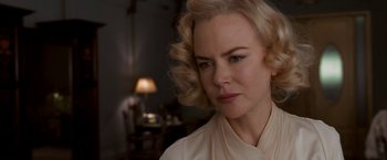 Movie still from “The Golden Compass” (2007), directed by Chris Weitz – A person wearing a white shirt; Close Up shot, Over the shoulder angle