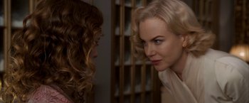 Movie still from “The Golden Compass” (2007), directed by Chris Weitz – Two women are looking at each other in a room; Close Up shot, Over the shoulder angle