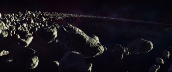 Movie still from “The Good Dinosaur” (2015), directed by Peter Sohn – An image of an asteroid in the night sky; Extreme Wide shot, High angle
