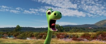 Movie still from “The Good Dinosaur” (2015), directed by Peter Sohn – The head and mouth of a green dinosaur; Extreme Close Up shot, High angle