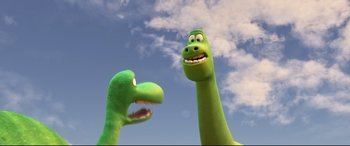 Movie still from “The Good Dinosaur” (2015), directed by Peter Sohn – Two green dinosaurs looking at each other in the sky; Medium shot, Low angle