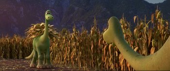 Movie still from “The Good Dinosaur” (2015), directed by Peter Sohn – A bunch of corn plants in the middle of a field; Extreme Wide shot, High angle