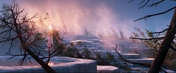 Movie still from “The Good Dinosaur” (2015), directed by Peter Sohn – A view of trees and rocks in the fog; Extreme Wide shot, High angle
