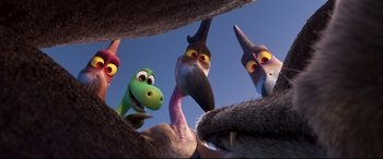 Movie still from “The Good Dinosaur” (2015), directed by Peter Sohn – A group of cartoon characters; Close Up shot, High angle