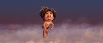 Movie still from “The Good Dinosaur” (2015), directed by Peter Sohn – An animated character is flying through the air; Wide shot, High angle
