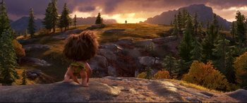 Movie still from “The Good Dinosaur” (2015), directed by Peter Sohn – A picture of a scene in the croods; Extreme Wide shot, High angle